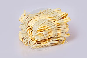 Dry thin rolled noodles square shape. Capelli d`angelo, Angel`s hair - pasta.