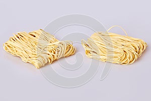 Dry thin rolled noodles square shape. Capelli d`angelo, Angel`s hair - pasta. photo