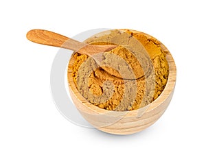 Dry turmeric powder or curcuma longa linn in spoon and wooden bowl isolated on white background ,include clipping path