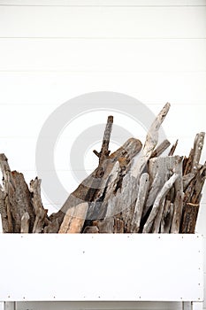 Dry twigs decorated on a white walls.