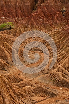 Dry valley red orange sand stone rock formation in