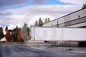 Dry van semi trailer loading and unloading in warehouse dock gates