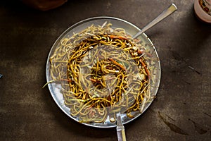 Dry vegetable chow mein noodles served in plate in himalayas