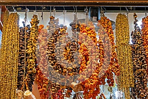 Dry vegetables hanging on a street market