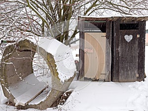 Dry wc. Wooden and secret place, heart on the door and snow