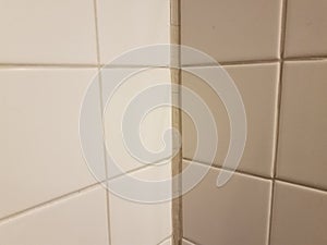 dry white tile caulk in bathroom or kitchen wall