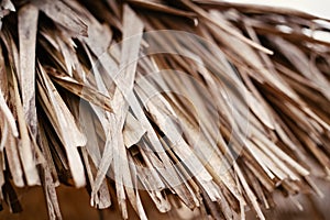 Dry yellow beige brown autumn fall thatch hay straw texture background wallpaper, part of thatch attap roof