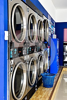 Dryer machine and washing machine in self service laundry station