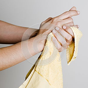 Drying hands with a towel