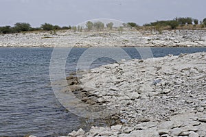 Drying lake shore line amistad reservoir photo