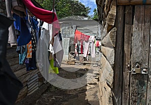 Drying laundry in the narrow streets of the slums of Nairobi, Kenya