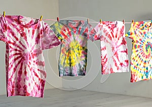 The drying process of T-shirts painted in tie dye style