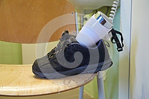 Drying shoes with a hairdryer