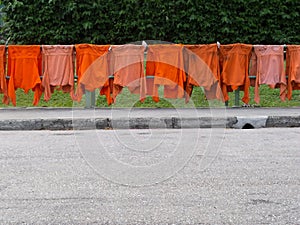 Drying uniforms by the roadside