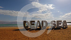 Drying waters of Dead sea, Ein Bokek, Israel photo