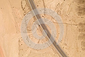 Dryness land with erosion terrain with highway crossing