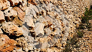 drywall texture. jammed stones. Menorca, Spain