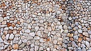 drywall texture. white and red interlocking stones. Menorca, Spain