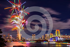 Odaiba, Tokyo, Beautiful and colorful firework with rainbow bridge and Tokyo city night