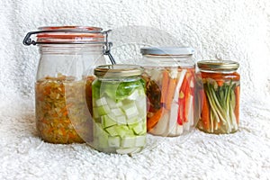Probiotic home made lacto-fermented vegetables in jars photo