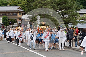 Children carrying Kodomo Mikoshi in Saga Matsuri parade. Arashiyama, Kyoto, Japan