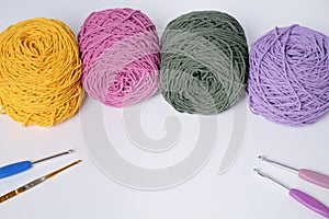 Various Color Yarn Balls with Knitting Needles iSolated on White Background.