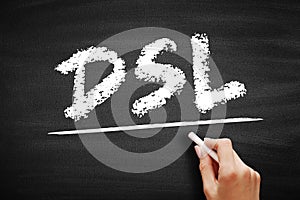 DSL Digital Subscriber Line - technology that are used to transmit digital data over telephone lines, acronym text on blackboard photo