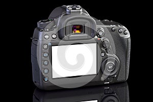 DSLR camera on black glass