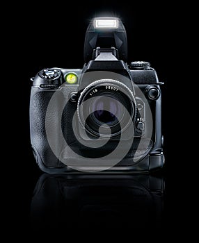 DSLR camera isolated 0n black