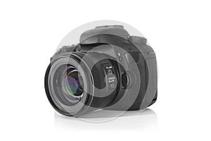 DSLR professional photo camera with a 35 mm lens on plexiglass