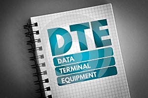 DTE - Data Terminal Equipment acronym on notepad, technology concept background photo