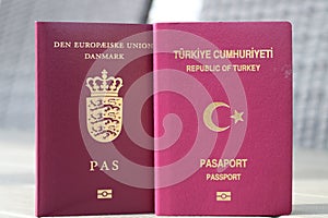 Dual citizenship concept. Danish and turkish passport. International id for danish and turkish citizen.