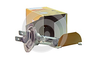 Dual-contact halogen spare lamp for low beam car headlights, out from its cardboard box. isolated on white background