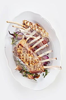 Dual portion serving of roasted rack of lamb