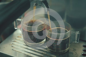 Dual shot espresso being made from machine