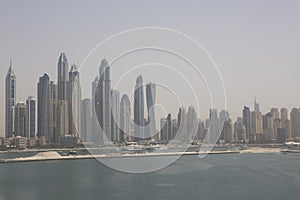 Dubai, beach with a skyscrapers view