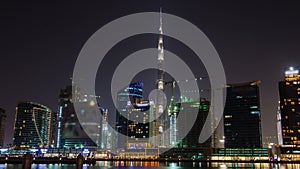 Dubai business bay night time lapse. pan up