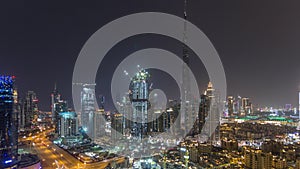 Dubai downtown cityscape with Burj Khalifa, LightUp light show aerial timelapse