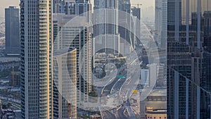 Dubai Downtown evening timelapse modern towers view from the top in Dubai, United Arab Emirates.