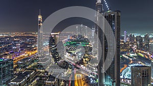 Dubai Downtown night timelapse modern towers panoramic view from the top in Dubai, United Arab Emirates.