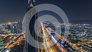 Dubai Downtown night timelapse modern towers panoramic view from the top in Dubai, United Arab Emirates.