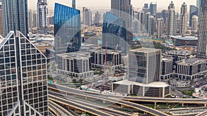 Dubai Downtown timelapse top view before sunset as shot from a rooftop viewpoint. Dubai, UAE