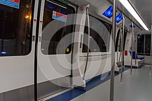 Empty Dubai Airport Subway Train communting from one terminal to another at night