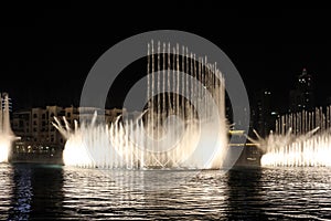 The Dubai Fountain in The Dubai Mall, world`s largest choreographed fountain system set on the 30-acre at Burj Khalifa Lake