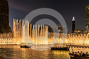 The Dubai Fountain in The Dubai Mall, world`s largest choreographed fountain system set on the 30-acre at Burj Khalifa Lake