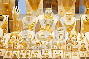 Dubai gold souk market window with jewellery, necklaces, bracelets and luxury accessories