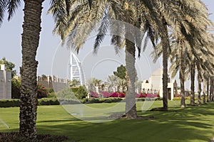 Dubai green promenade with Burj al Arab in the background