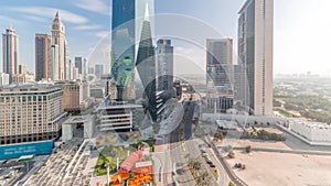 Dubai International Financial district aerial all day timelapse. Panoramic view of business and financial office towers.