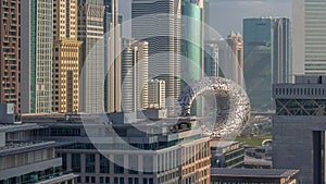 Dubai International Financial district aerial timelapse. Panoramic view of business and financial office towers.