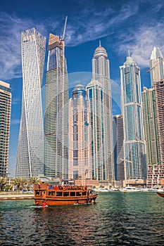 Dubai Marina with boat in Dubai, United Arab Emirates